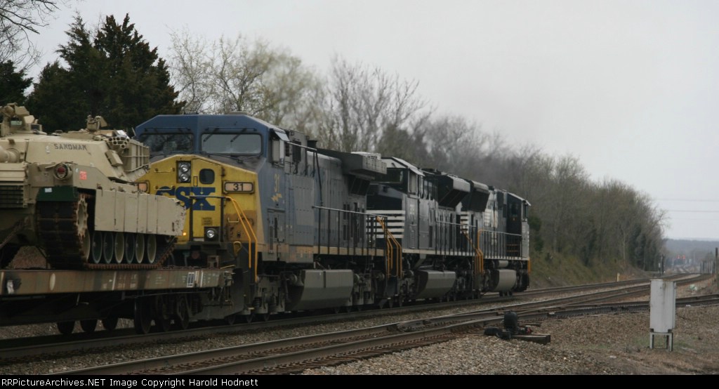 CSX 31 is a trailing unit on NS train 11R heading for the signals